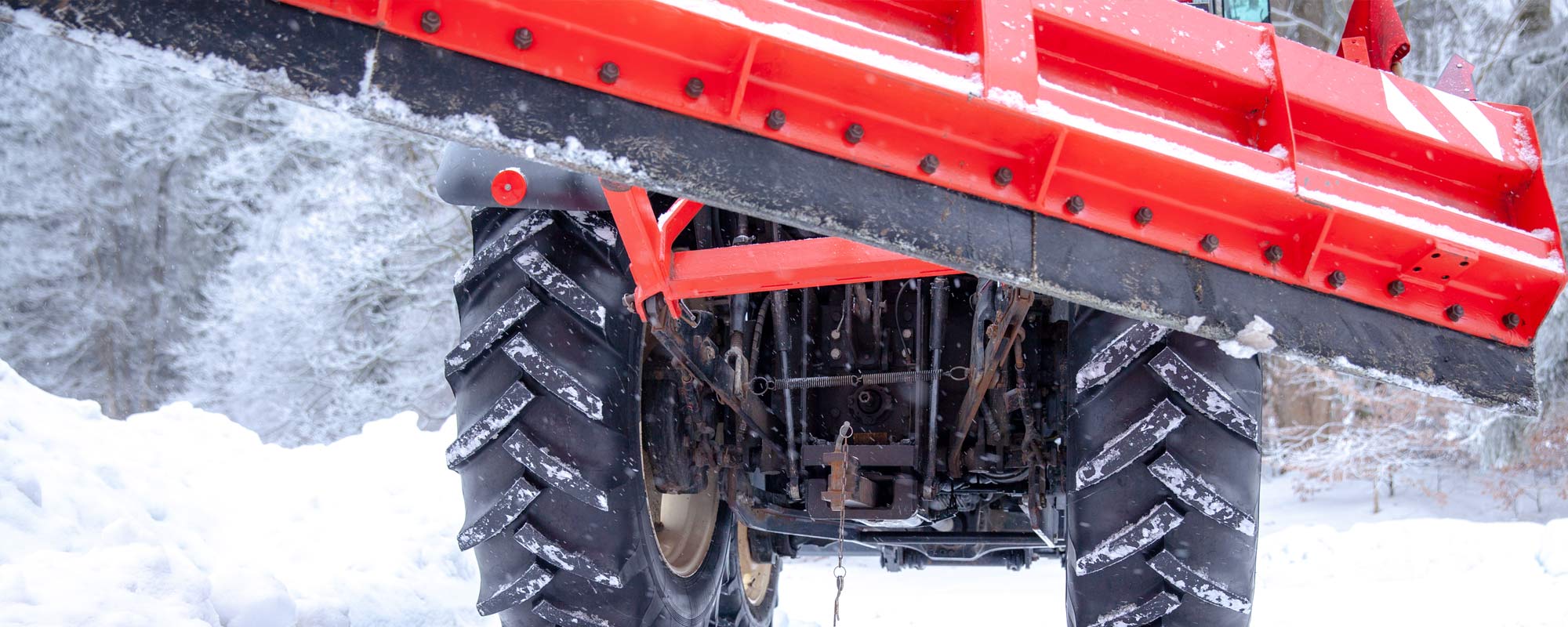 machine pushing snow